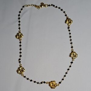 Elegant Gold and Black Floral Necklace